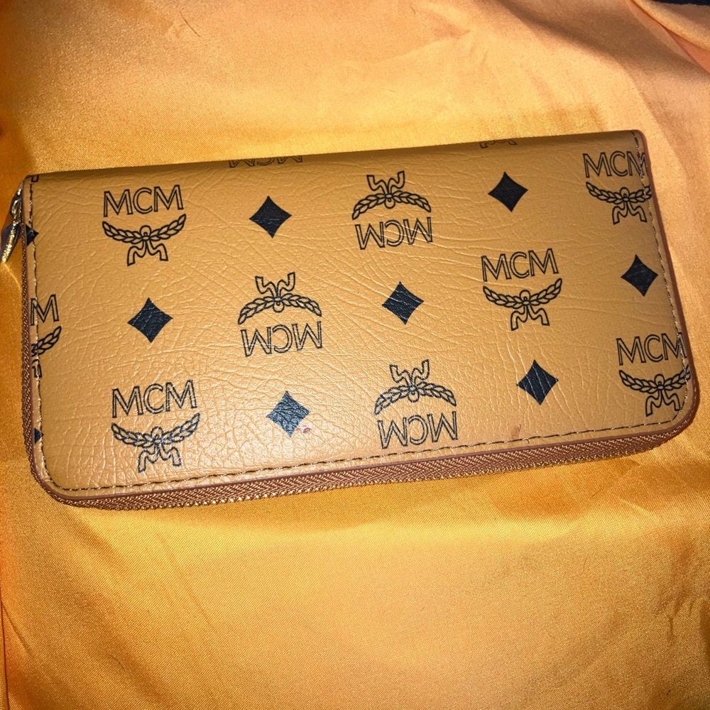 MCM Tan Wallet with Iconic Pattern and Zipper Closure